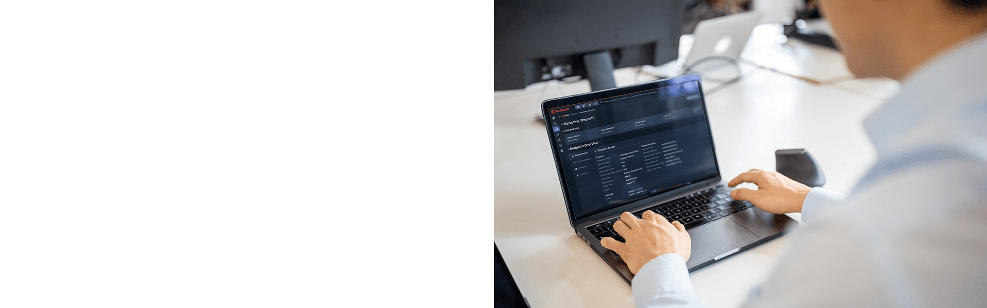 Person, die das Tanium-Dashboard auf einem Laptop zur Endpunktverwaltung verwendet