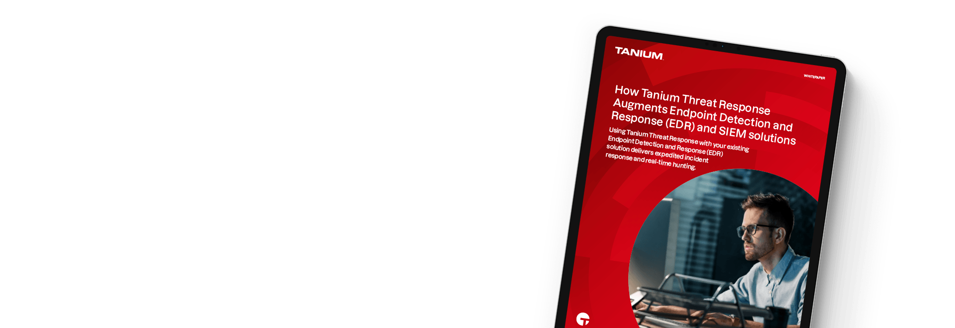 Tablet showing How Tanium Threat Response whitepaper with man at desk